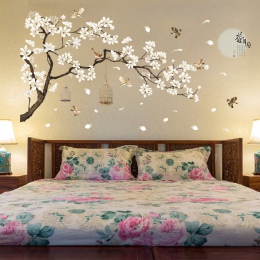 Dekoracyjne samoprzylepne naklejki ścienne przedstawiające kwitnące drzewo z fruwającymi ptaszkami do salonu sypialni jadalni