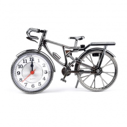 Oryginalny nowoczesny elektroniczny zegarek kwarcowy w kształcie oldschoolowego roweru w kolorze srebrnym do biura