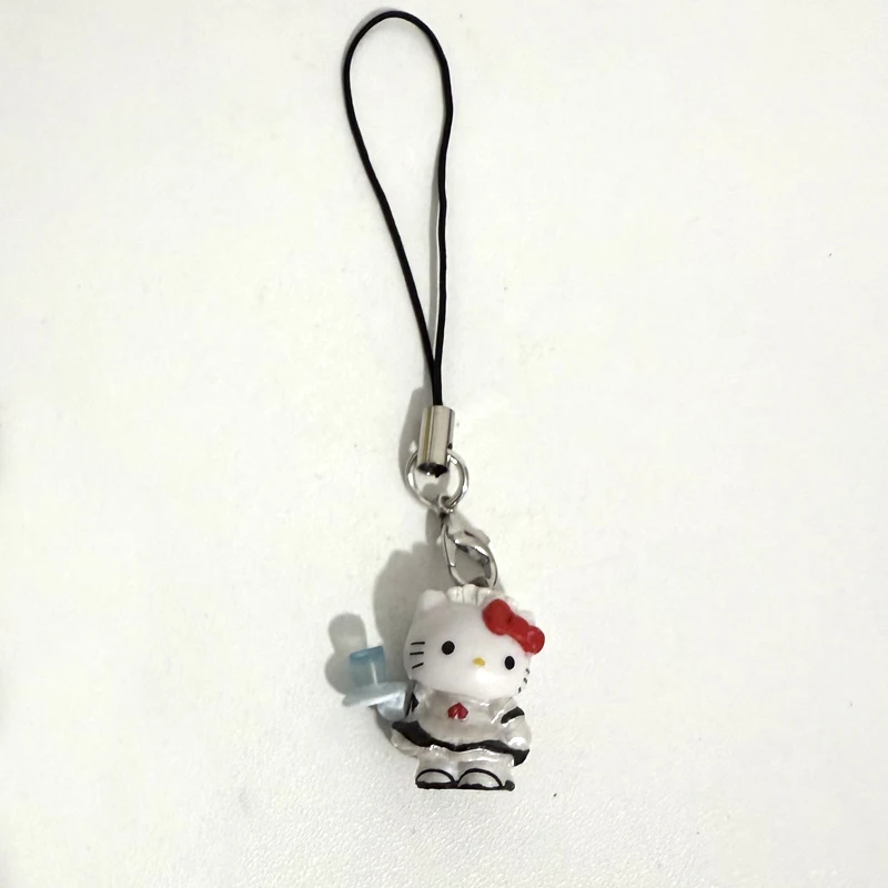 Brelok Hello Kitty na motocyklu, zawieszka do torby śliwka