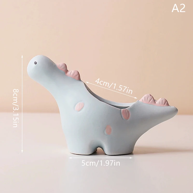 Ceramiczna doniczka w kształcie zwierzęcia słoń dinozaur żółty