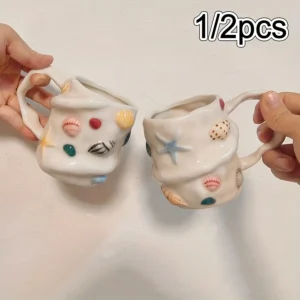 Ceramiczny kubek do kawy z motywem muszelek 300 ml — ręcznie malowany Jasnozielony