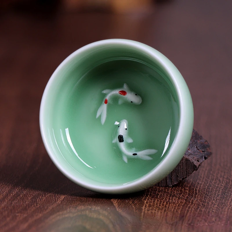 Porcelanowe filiżanki do herbaty Longquan Celadon ze złotą rybką Jasnozielony
