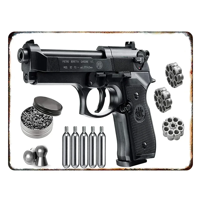 Metalowy znak ścienny retro pistolet pneumatyczny – dekoracja garażu i man cave Magenta