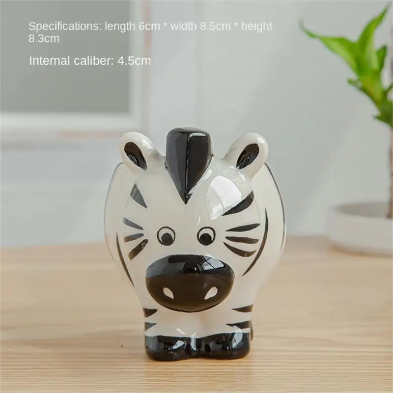 Mini doniczka ceramiczna w kształcie zwierzęcia — lis, zebra, owca Fioletowy