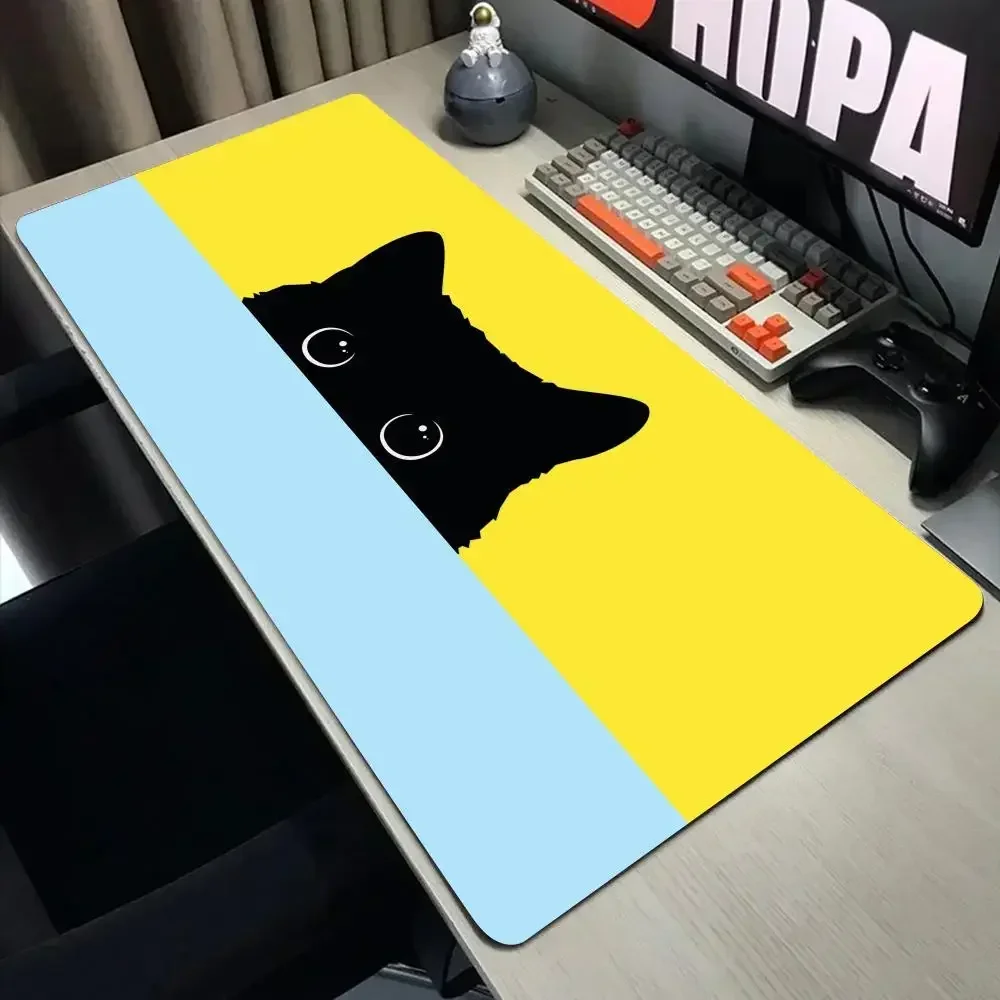 Podkładka pod mysz XXL z czarnym kotem – duża mata na biurko 30x60 Pomarańczowy