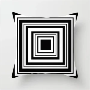 Poszewka czarno-biała geometryczna patchwork z literami żółty