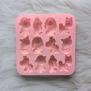 Silikonowe foremki ze zwierzątkami, 12 wnęk, 6 wzorów 011pink