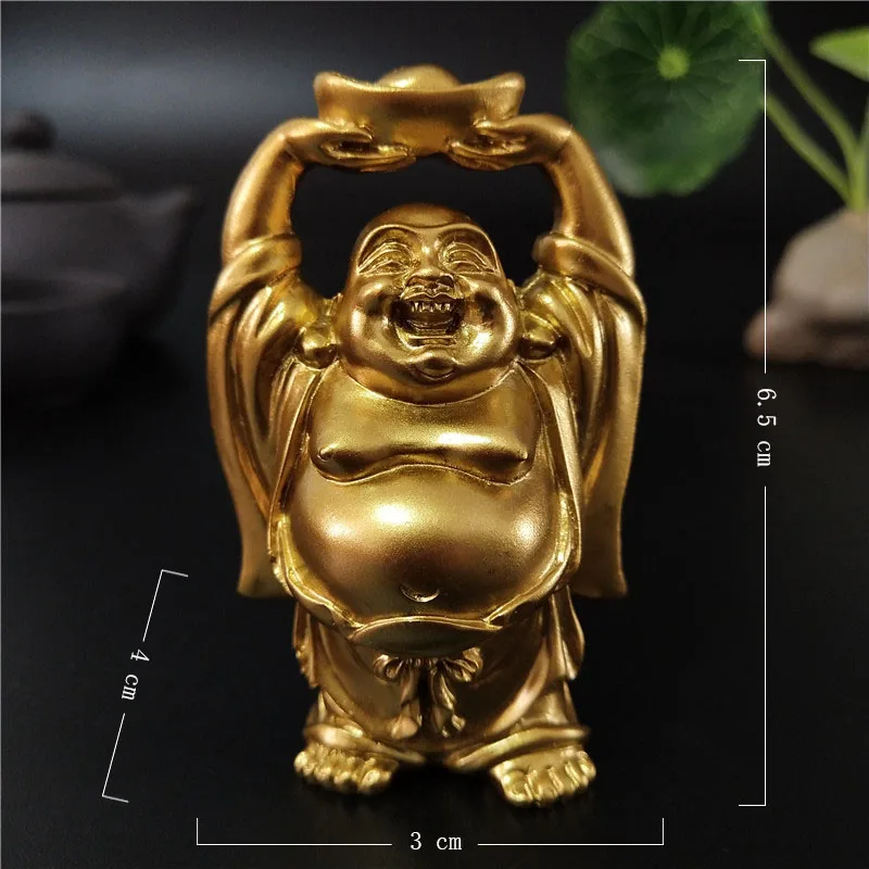 Śmiejący się Budda feng shui — złota figurka dobrobytu Jasny